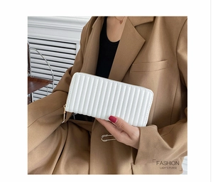 White pleated long PU leather wallet with vertical stripes and golden zipper for women