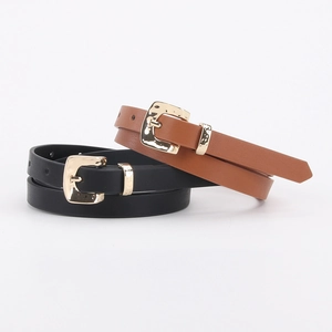 Fashionable slim leather belts for women in black and brown with golden D-shaped buckles