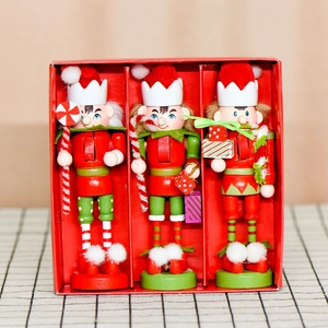 Three 13cm wooden Christmas nutcracker elf hanging decorations in a festive gift box