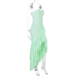 Detail view of mint green strapless dress with asymmetric tiered ruffle hem on mannequin