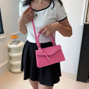 Pink pleated crossbody bag with dual handles and gold hardware for women's casual style