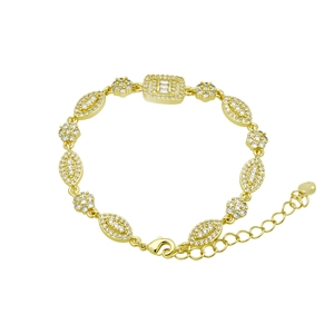 Close-up of gold-plated bracelet with white zircon butterfly and heart-shaped charms