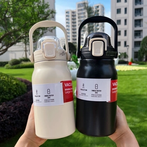 Close-up of 304 stainless steel insulated bottles with matte finish and safety locks