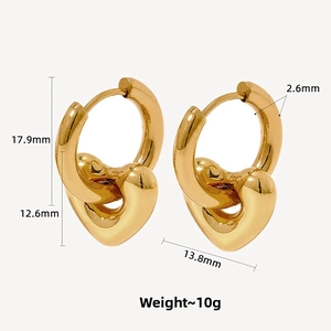 Detail view of gold heart earrings showing dimensions 17.9mm height and 10g weight