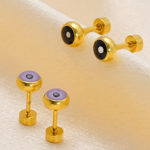 Minimalist 18K gold plated titanium steel evil eye stud earrings on silk background