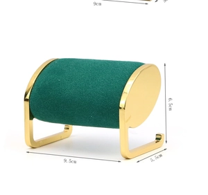 Detail of emerald velvet watch display stand with gold metal frame and size dimensions
