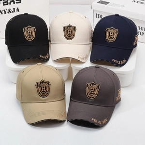 Structured cotton baseball caps with shield embroidery in five versatile colors