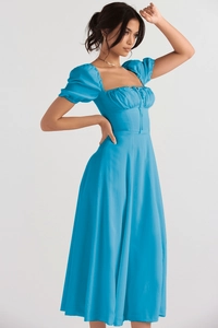 Close-up of sky blue floral midi dress with puff sleeves and lace-up square neckline