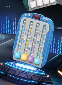 Blue rhythm music game machine featuring four color buttons and 999 digital score display
