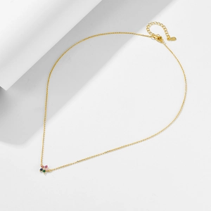 Detail of s925 silver gold-plated necklace featuring a colorful zircon flower pendant