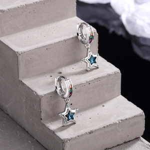 S925 silver hoop earrings with blue star charms and colorful zircons on a gray stone base