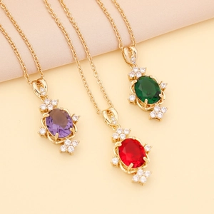 Elegant gold necklaces with oval multicolored gemstones and sparkling diamond accents