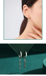 Detailed view of S925 silver long tassel earrings with colorful inlaid gemstones