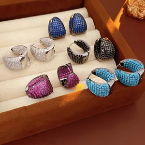 Chic C-shaped hoop earrings set with colorful micro-pave cubic zirconia on velvet stand