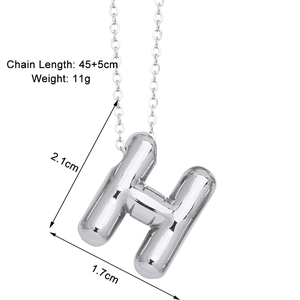 Close-up of silver letter H pendant with dimensions 45cm chain and 11g weight detail