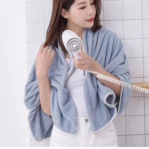 Thick light blue coral fleece wearable bath towel wrap with button closure for adults