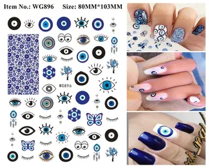 Detailed evil eye nail stickers with dreamcatchers and butterfly patterns on real nails