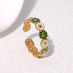 Minimalist gold daisy flower ring with green and white enamel details for women