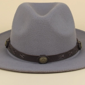 Close-up of gray felt fedora hat with brown band and vintage copper petal buckle detail