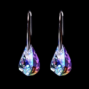 Sparkling pear-shaped aurora crystal drop earrings with polished silver hooks on black background