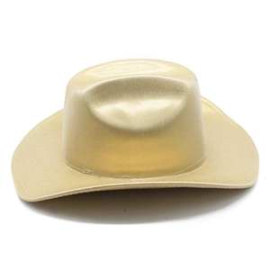 Detail of metallic gold cowboy hat featuring textured fiber and wide curved brim design
