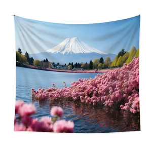 Detail of Mount Fuji tapestry featuring pink blossoms and blue lake on white background