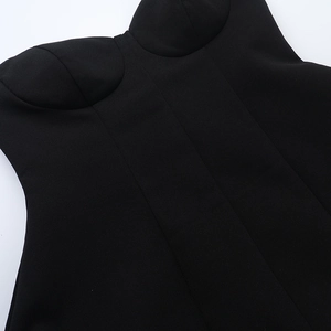 Detail of a black strapless dress with structured cups and premium double stitching