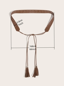 Detail of a brown PU leather cutout belt featuring tassel fringe and beadwork decoration