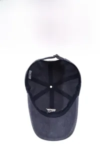 Detailed interior of vintage washed baseball cap showing breathable mesh and metal buckle
