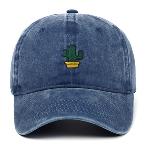 Vintage washed blue denim baseball cap featuring a green cactus embroidery design