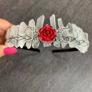 Handmade silver moon crown with white crystals and red roses on a black headband
