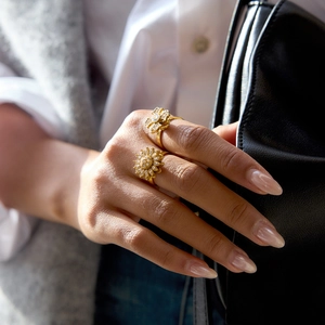 Adjustable 18K gold-plated stainless steel sunflower ring with sparkling white zircon stones