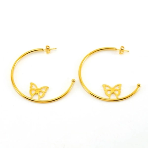Golden butterfly hoop earrings crafted from stainless steel on a white background