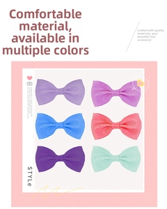 Detail of colorful grosgrain ribbon hair bows showing texture and vibrant color set