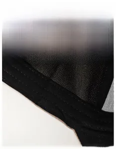 Detail view of the wide moisture-wicking sweatband and triple stitching on the baseball cap