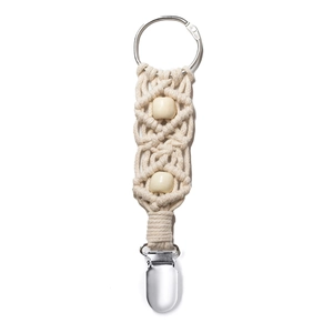 Detail view of cream braided cotton hat clip with wooden beads and silver metal clasp