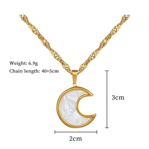 Detail view of gold moon necklace showing 40+5cm chain length and 6.9g weight specs
