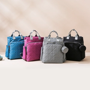 Waterproof diaper backpack in four colors with diamond stitching and round pouch