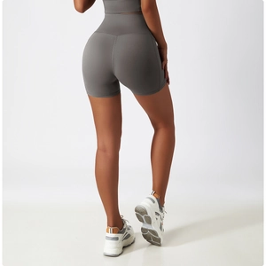 Rear view of high waisted dark grey compression yoga shorts with scrunch butt lift detail