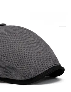 Detail view of waffle texture fabric and flexible foldable wide brim on retro beret hat