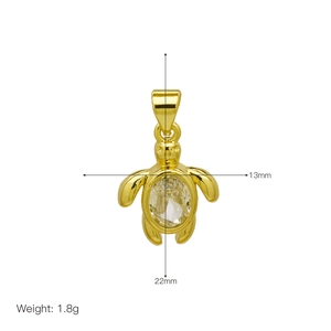 Detailed view of a gold-plated turtle pendant with clear stone and 22x13mm dimensions