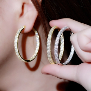 Luxurious 18K gold and silver plated pavé hoop earrings with sparkling zircon stones