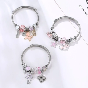 Silver stainless steel charm bracelet with pink crystal heart and starfish pendants