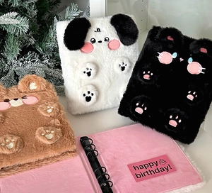 Detailed view of plush A6 binder journals featuring cute embroidered puppy bear and cat faces