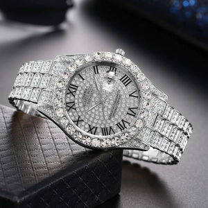 Luxurious silver quartz watch with full diamond inlay and date window on a gift box