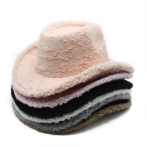 Various colors of plush cowboy hats in pink black and white showing soft wool texture