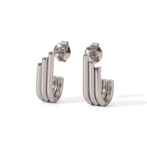 Detailed view of silver stainless steel earrings with a triple-row J-shape design