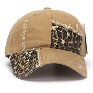 Distressed khaki baseball cap with leopard print patches and frayed edge details
