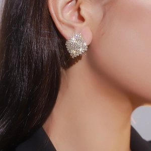 Elegant geometric square stud earrings with full micro-pave crystals on a female model