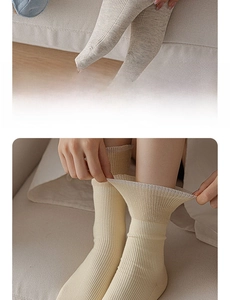 Close-up of elastic ribbed cuffs on breathable soft cotton lace-up mid-calf socks